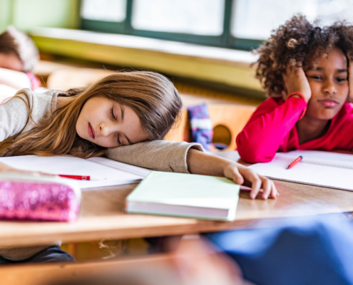 Kids sleeping at school