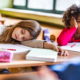 Kids sleeping at school